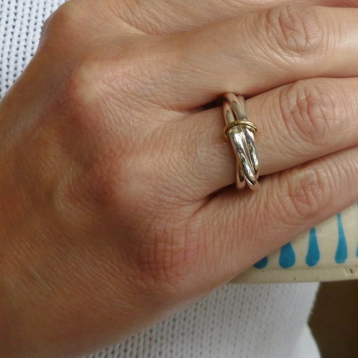 Unusual, unique, bespoke and modern silver "Russian Wedding ring" playful and tactile with brushed finish. Handmade by Sue Lane Contemporary Jewellery UK. 