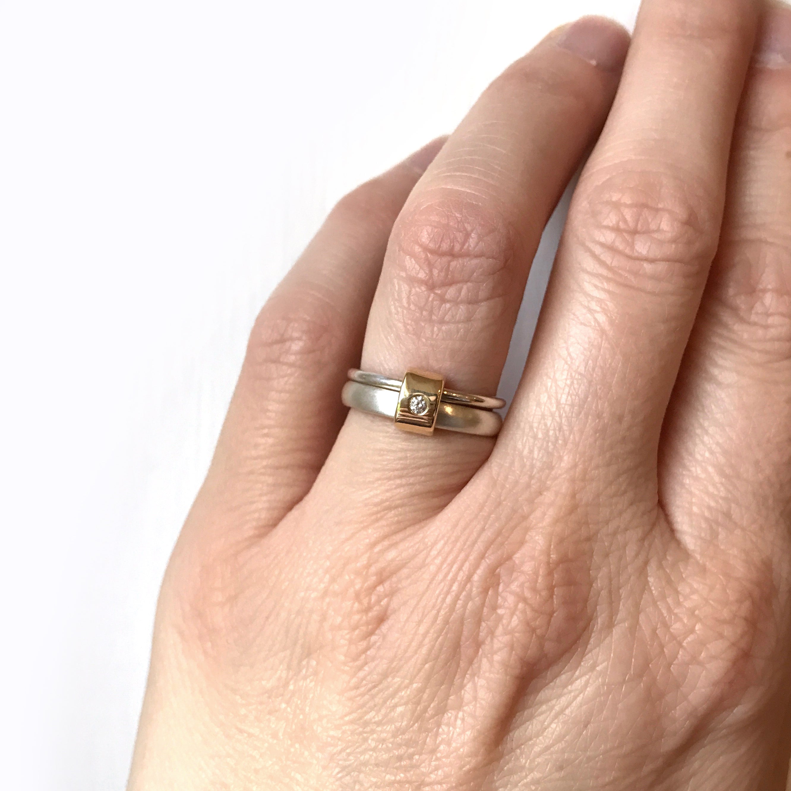 contemporary silver and gold two band stacking ring