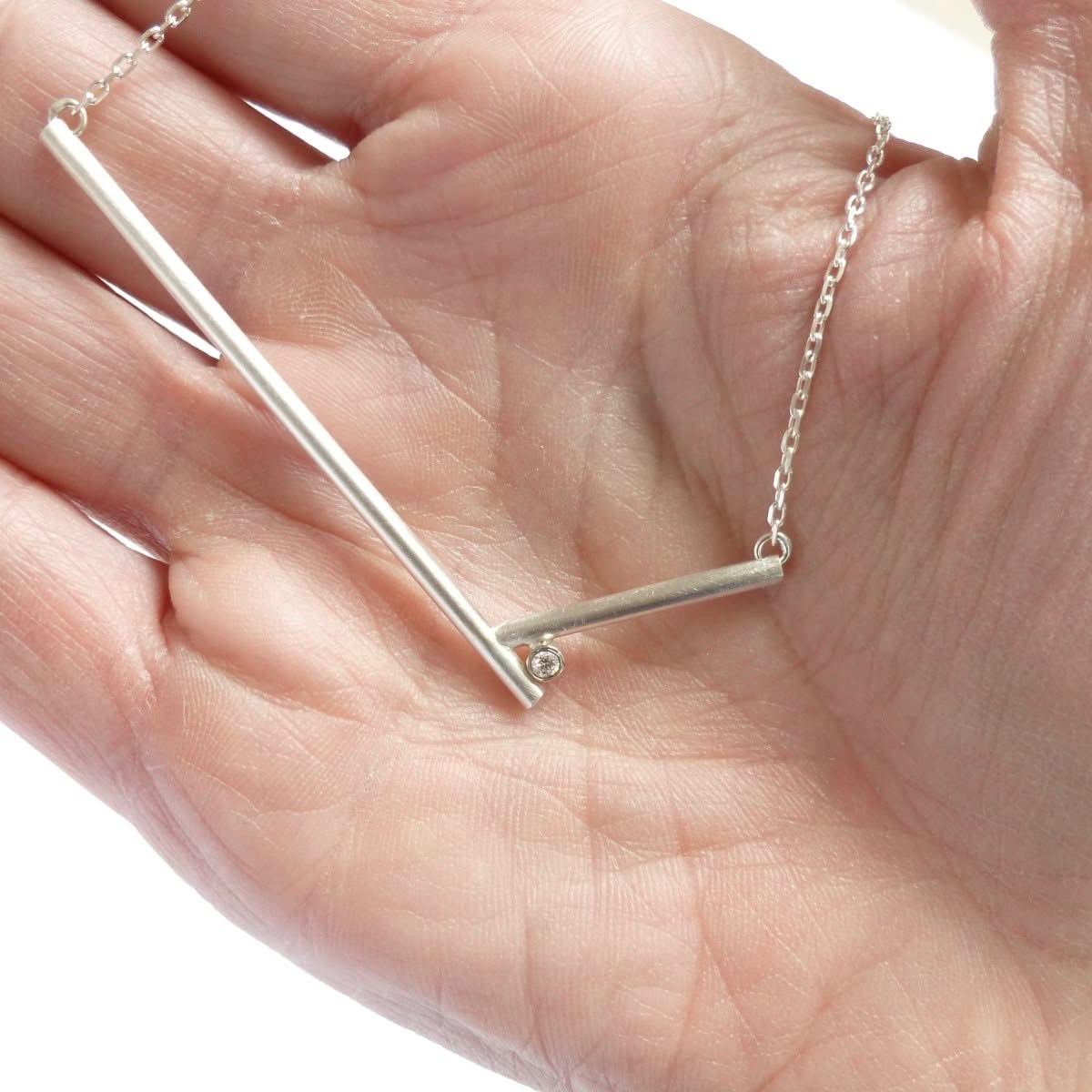 bold and simple contemporary silver and diamond necklace by Sue Lane 