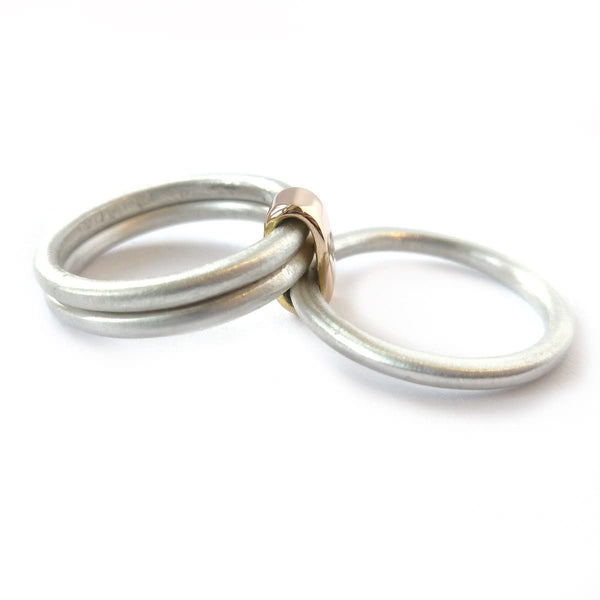 Unusual, bespoke and modern diamond wedding ring in silver and gold. Handmade by Sue Lane Contemporary Jewellery in Herefordshire, UK. Unique wedding ring.