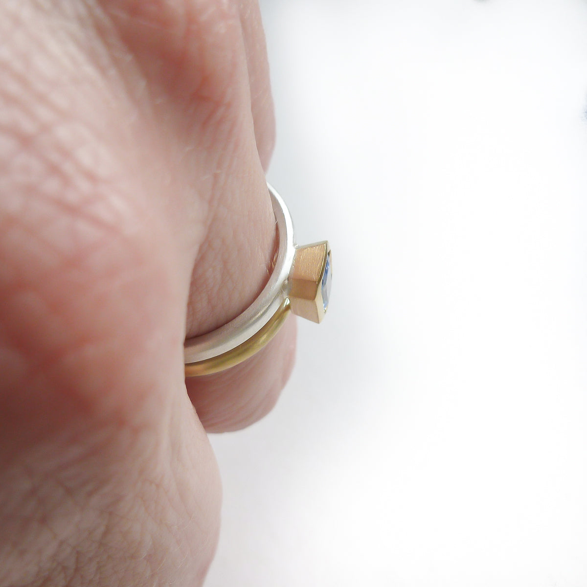 Silver 18ct gold and blue sapphire two band ring - bespoke and unique.