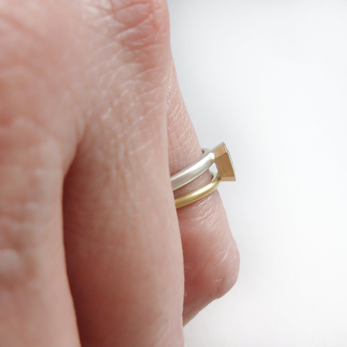 Silver 18ct gold and blue sapphire two band ring - bespoke and unique.