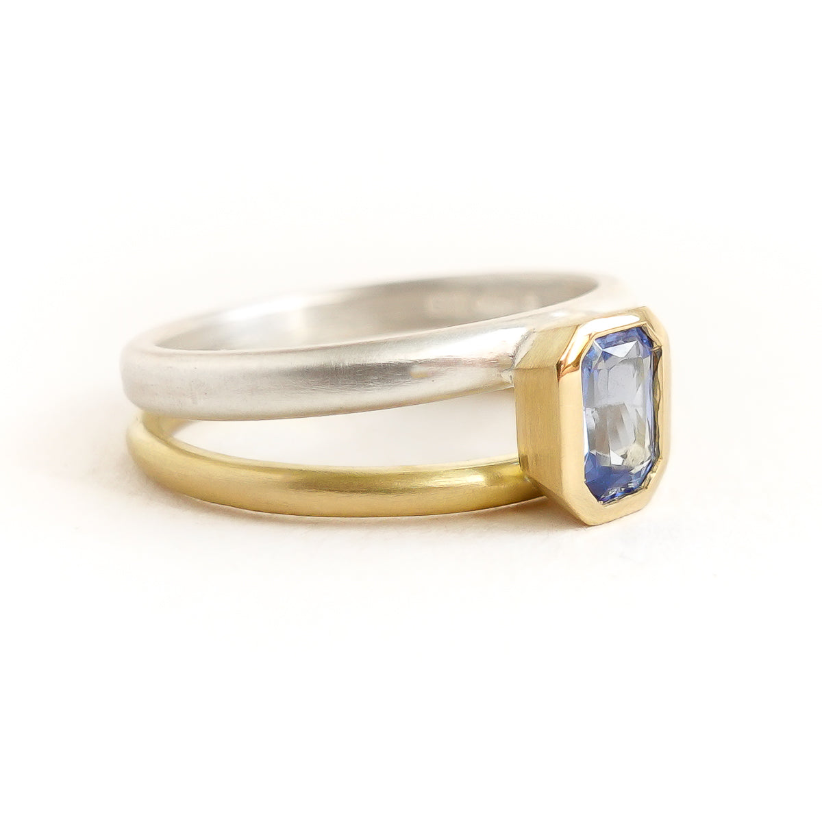 Silver 18ct gold and blue sapphire two band ring - bespoke and unique.
